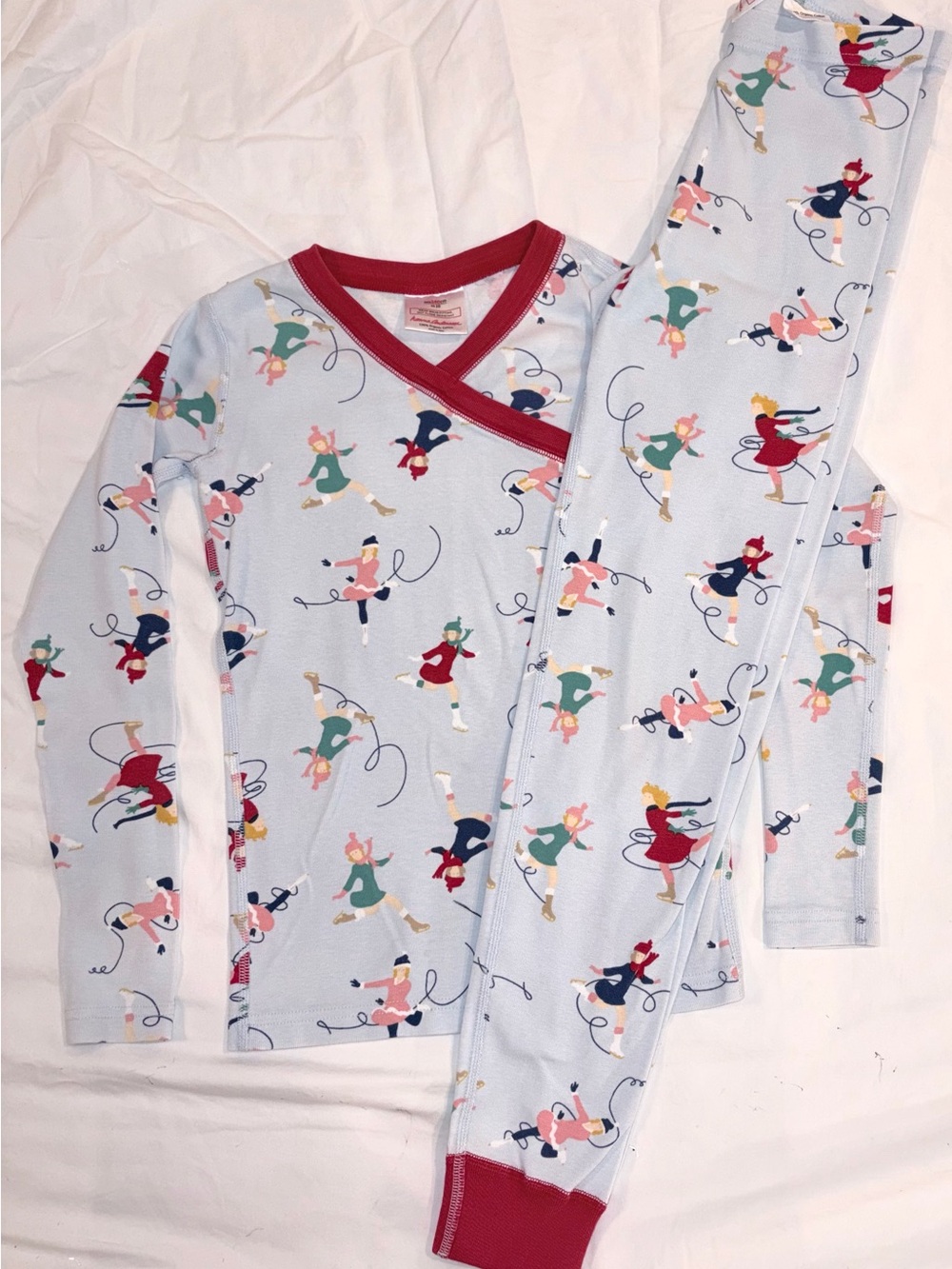 Hanna Andersson soft blue pajamas with all over ice skating design sz 10 EUC